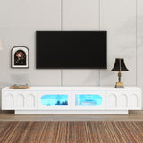 ON-TREND Luxury Fluted TV Stand for TVs Up to 85", Faux Marble Tabletop Media Console with 4 Drawers, Curved Profile Design, Modern Entertainment Center with Gold Base for Living Room, Black